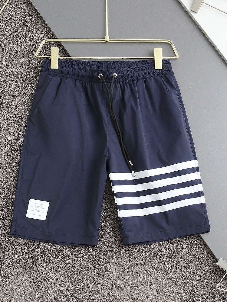Four-bar beach shorts THOM TREND