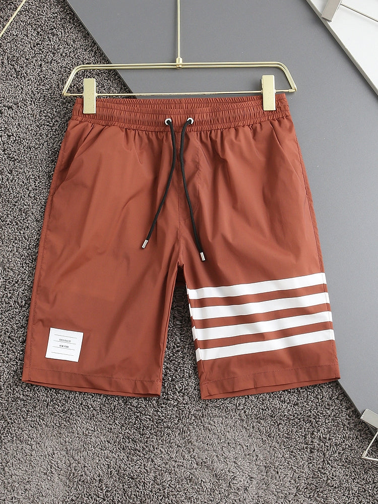 Four-bar beach shorts THOM TREND