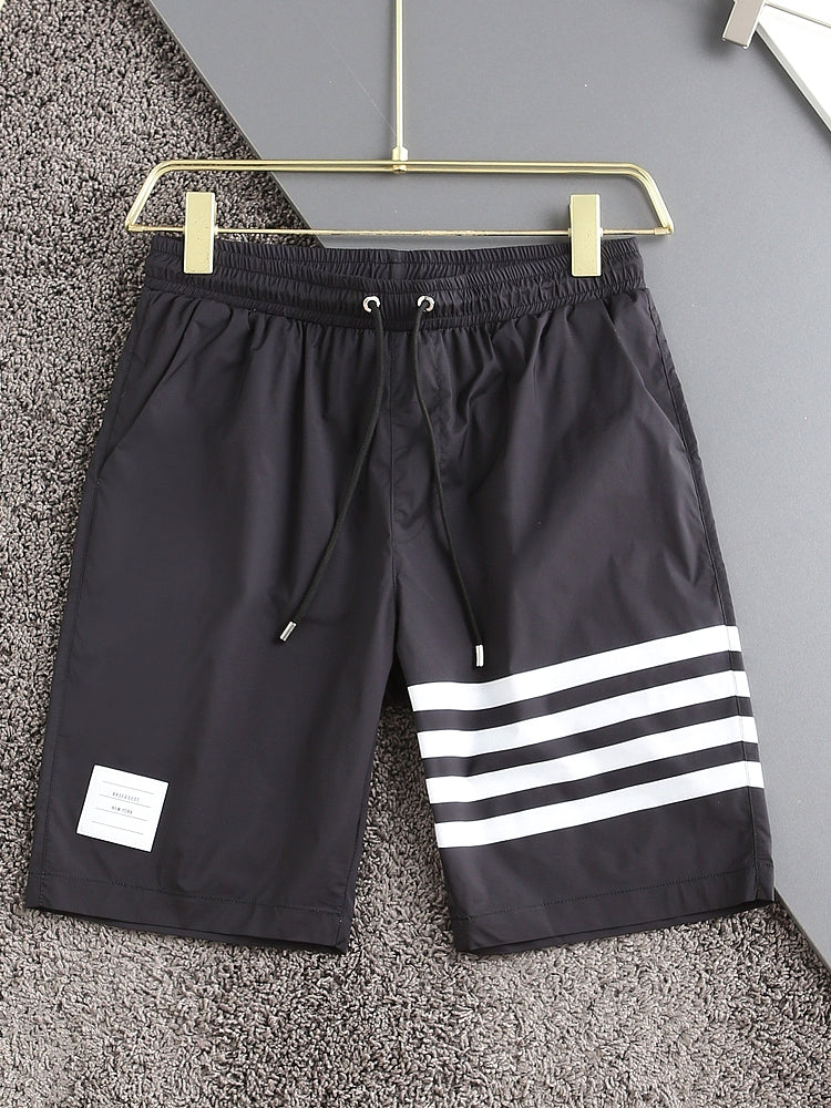 Four-bar beach shorts THOM TREND