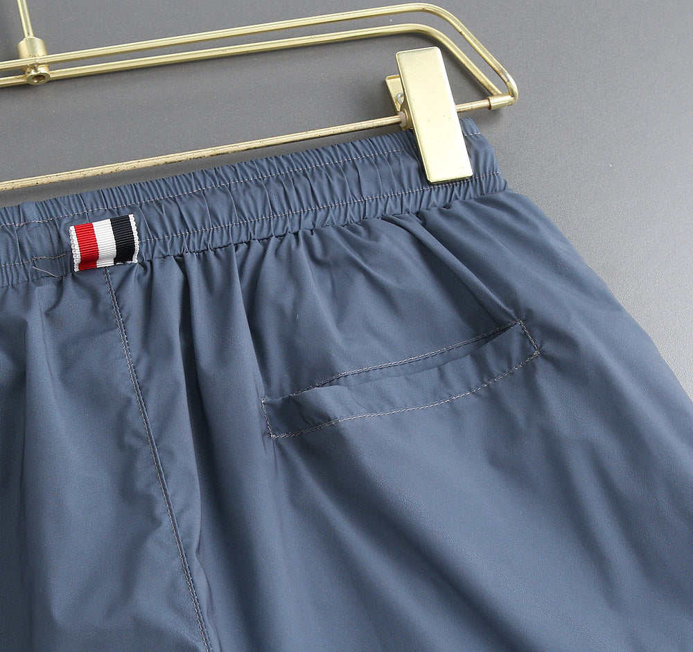 Four-bar beach shorts THOM TREND