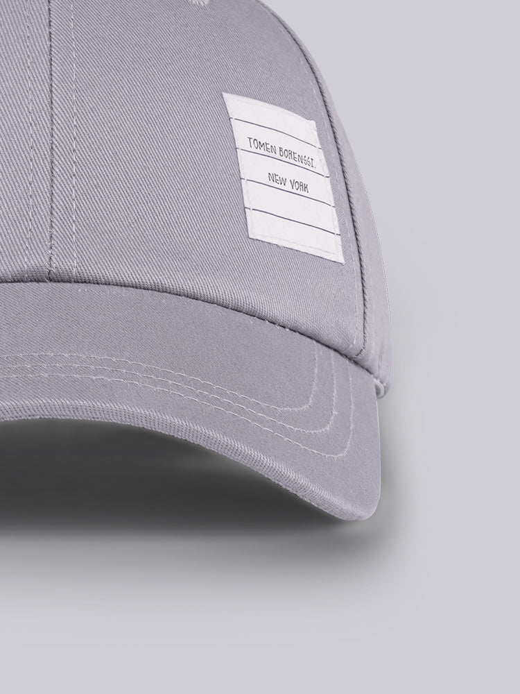 Solid color cap THOM TREND