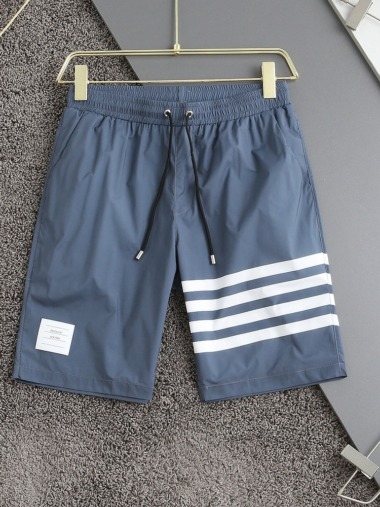 Four-bar beach shorts THOM TREND