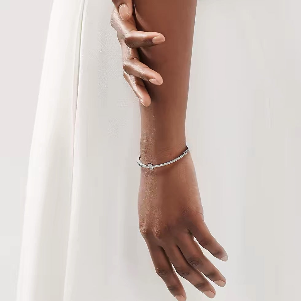 Tiffany Style T Motif Cubic Zirconia 18K Gold-Plated Bangle detail view 3