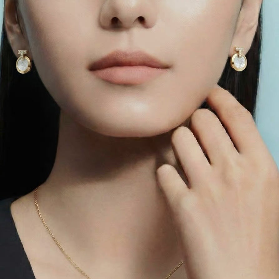 Tiffany Style T Motif Cubic Zirconia Earrings detail view 3