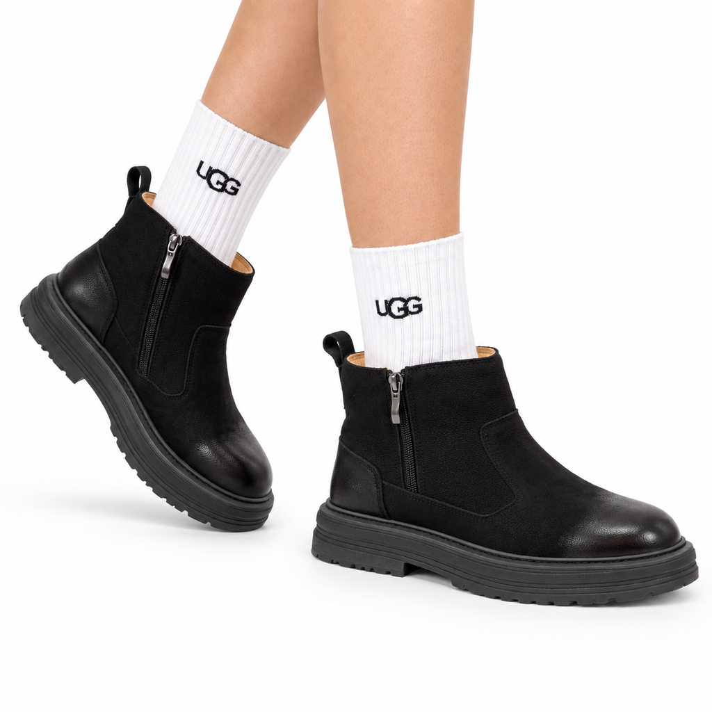 UGG Black Pull-On Leather Chelsea Boots - side-angle hero view