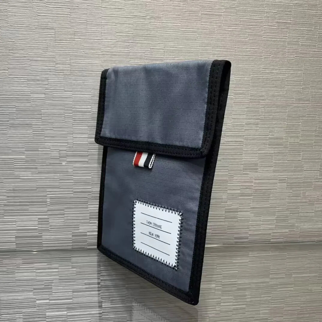 2025 Small mobile phone bag THOM TREND